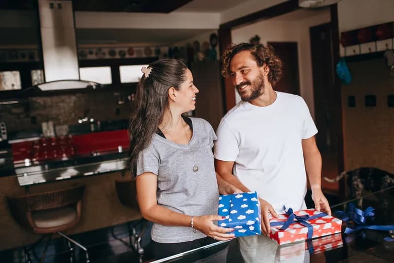 A couple with the gifts they received